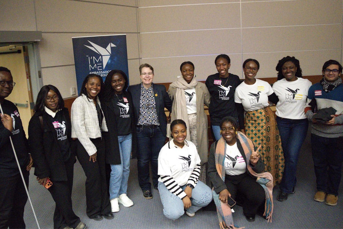 A group gathered at an I’MME Ambassador of Equity event